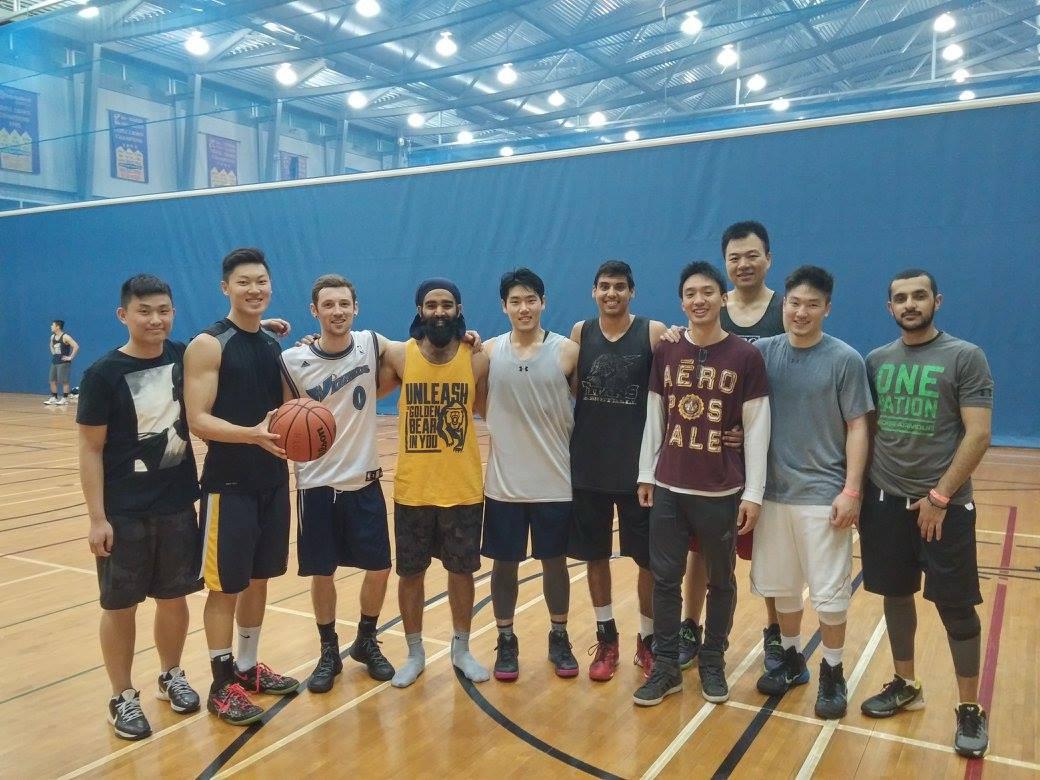 Aron with basketball team at UBC